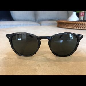 Oliver People’s “Finley” gray sunglasses